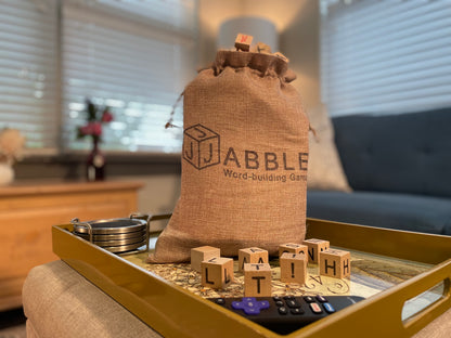 JABBLE: Word-Building Game | Stacking Word Game, Crosswords & Up-Words, Hardwood Letter Blocks, Burlap Drawstring Pouch, One or More Players (Classic Edition)